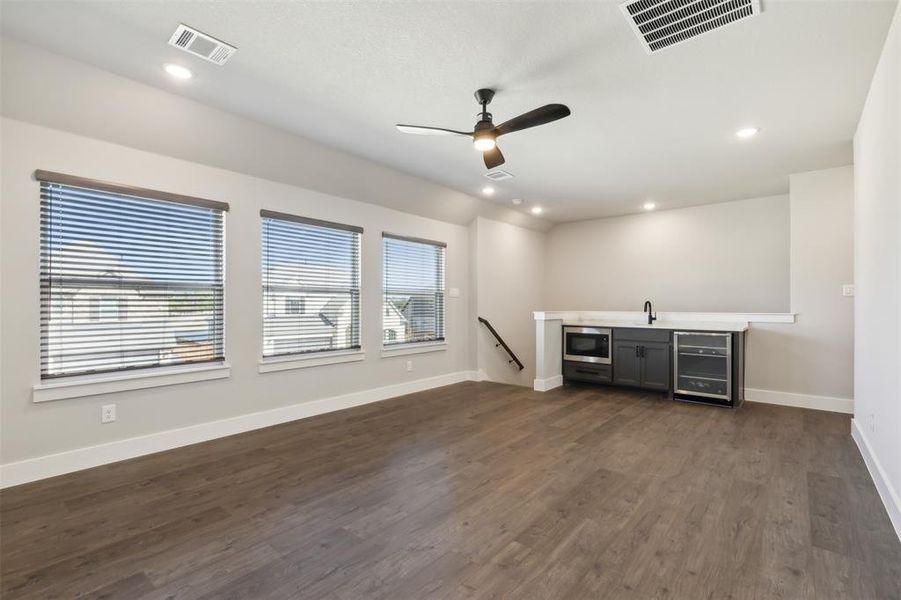 Entertainment area with beverage cooler, and wet bar