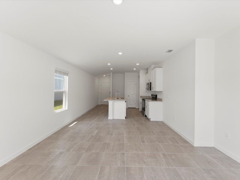 Spacious, unfurnished interior of a new home in Flagler Village - Classic Series, Palm Coast (Image 10).