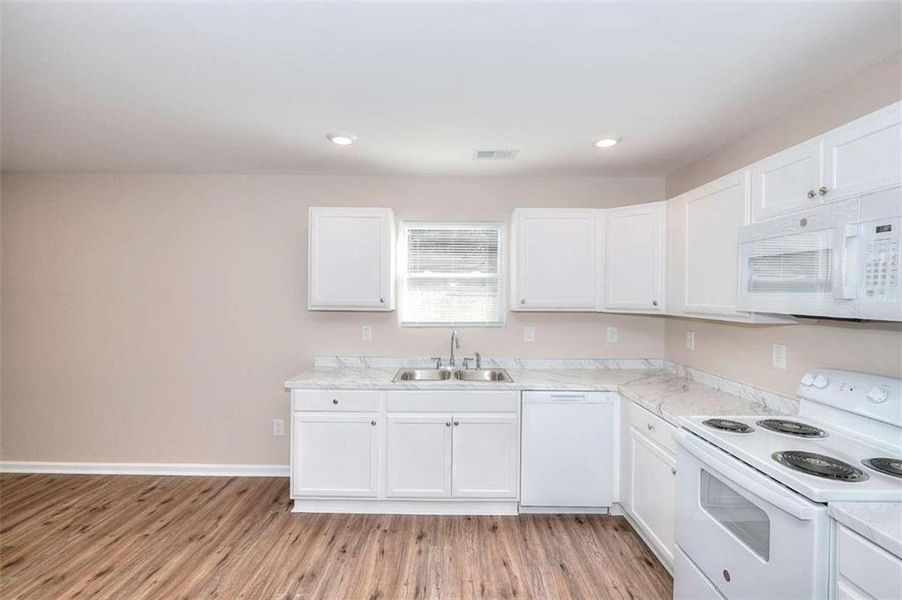 Furnished interior view inside a new home in , Monroe (Image 6).