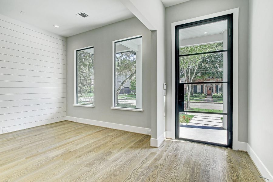 As you enter this wonderful home you will notice the custom 5" white oak flooring throughout. As you enter this wonderful home you will notice the custom 5" white oak flooring throughout.