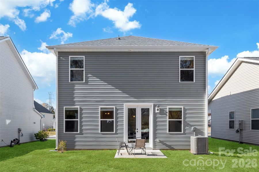 Exterior details and patio area of a home in Surrey Woods, Charlotte (Image 3).