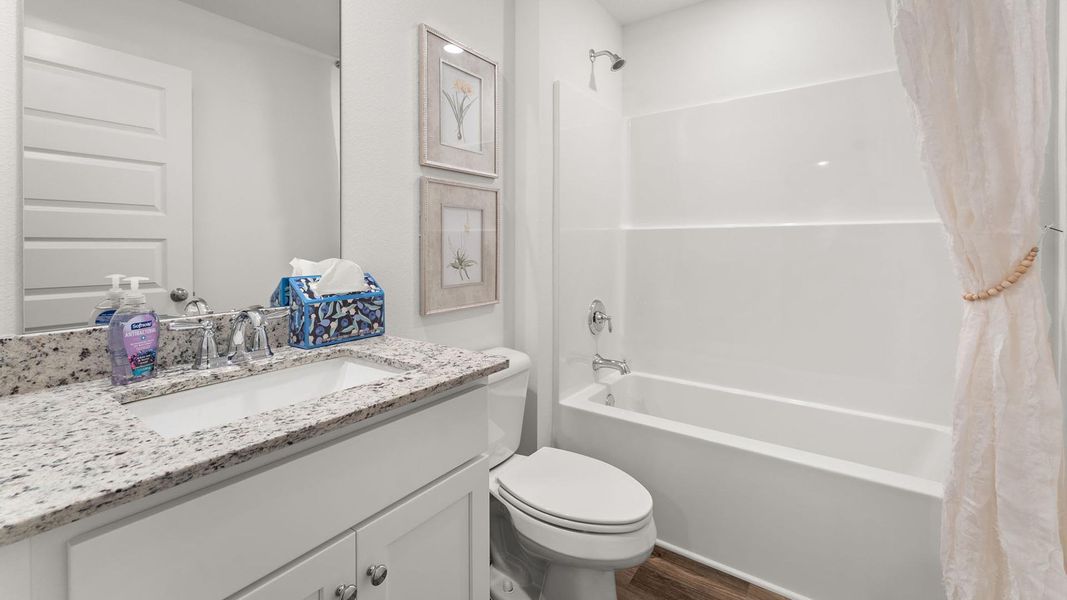 Furnished interior view inside a new home in Magnolia at the Bluffs Phase 3, Freeport (Image 29).