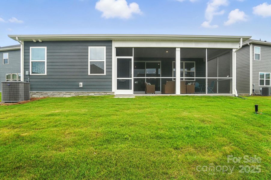 Exterior details and patio area of a home in Waxhaw Landing, Monroe (Image 3).