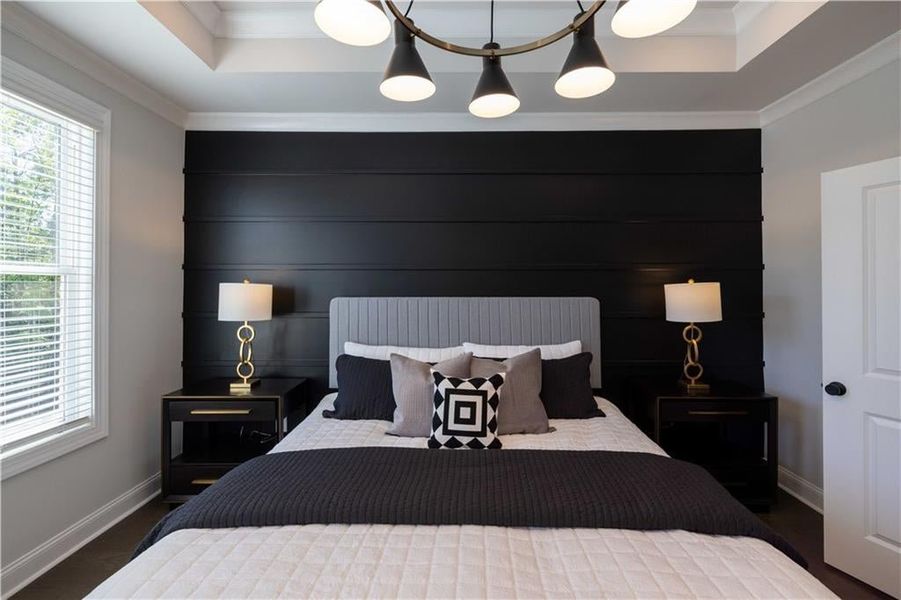 The primary bedroom with trey ceiling. *Please note that pictures shown are of the Jacobsen II floorplan but they are not of the actual home listed.