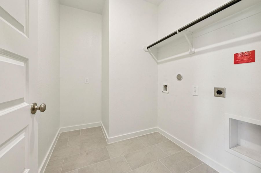 Photo is not of the actual home, but is an inspirational photo of builder’s model home and may depict options, furnishings, and/or decorator features that are not included