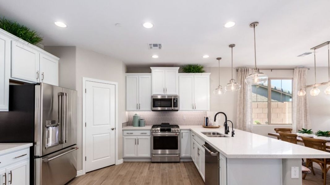 Representative furnished interior of a home built from the Champlain by Taylor Morrison in Mystic Discovery Collection, Peoria (Image 59). Representative furnished interior of a home built from the Champlain by Taylor Morrison in Mystic Discovery Collection, Peoria (Image 59).