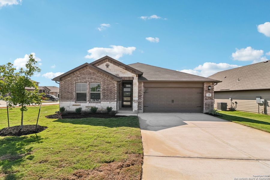 Front exterior of a new home in Legendary Trails - Classic Series, Cibolo, TX, highlighting curb appeal (Image 21).
