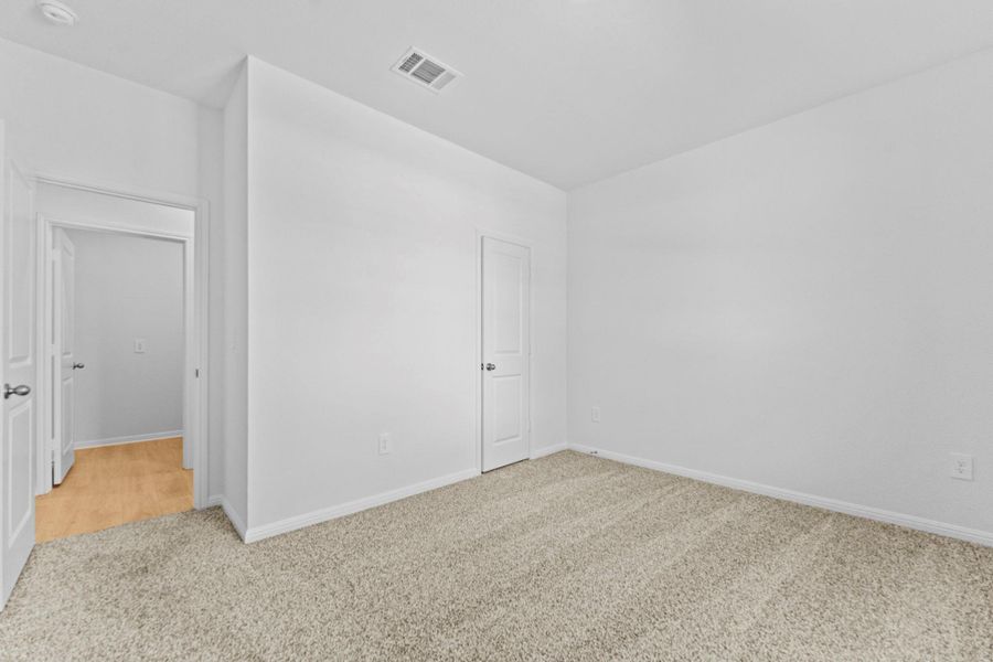 Spacious, unfurnished interior of a new home in Bar W Ranch, Leander (Image 26).