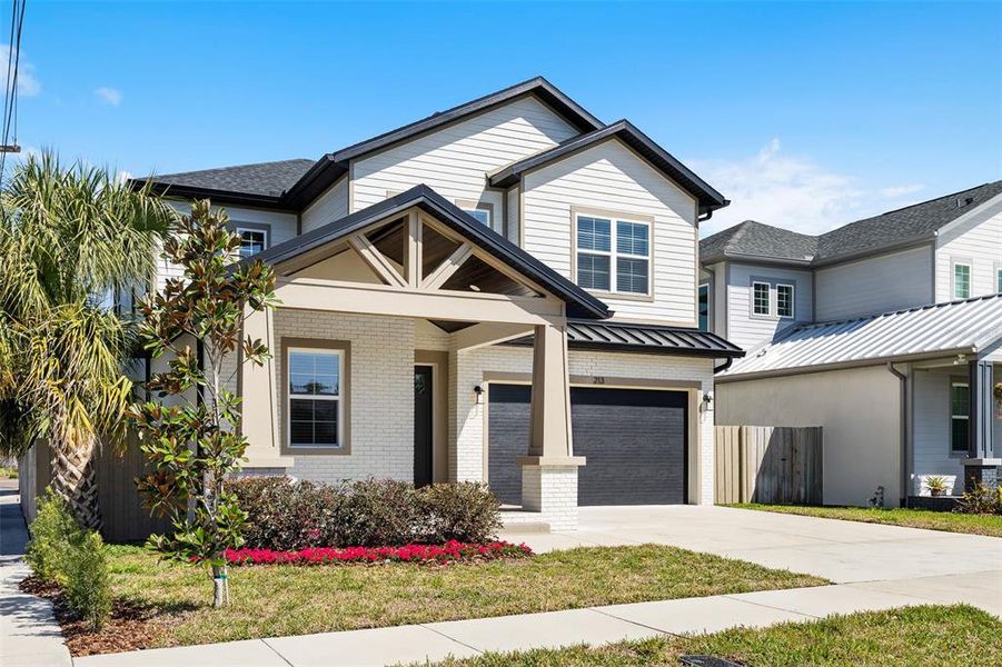 Front exterior of a new home in , Tampa, FL, highlighting curb appeal (Image 20).
