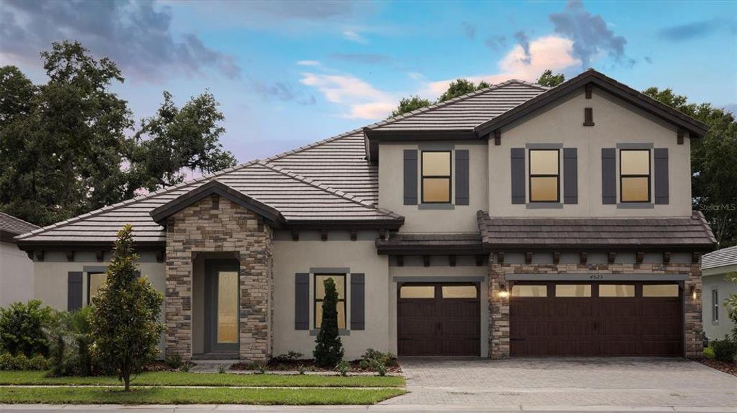 Front exterior of a new home in Crestwood Estates, Valrico, FL, highlighting curb appeal (Image 1).