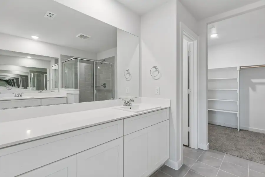 Primary Bathroom in the Harrison home plan by Trophy Signature Homes – REPRESENTATIVE PHOTO Primary Bathroom in the Harrison home plan by Trophy Signature Homes – REPRESENTATIVE PHOTO
