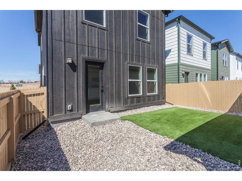 Exterior details and patio area of a home in Prairie Song Story Collection - Single Family Homes, Windsor (Image 27).