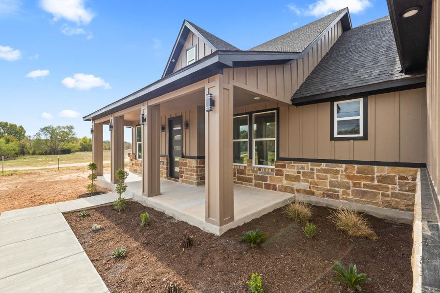 Exterior details and patio area of a home in , McDade (Image 2).