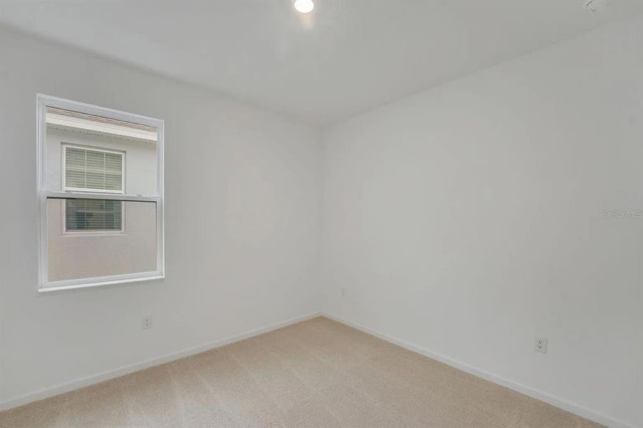 Spacious, unfurnished interior of a new home in Cypress Park Estates, Haines City (Image 32).
