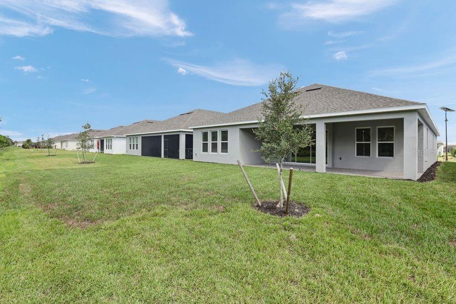 Exterior details and patio area of a home in The Cove at West Port, Port Charlotte (Image 24). Exterior details and patio area of a home in The Cove at West Port, Port Charlotte (Image 24).