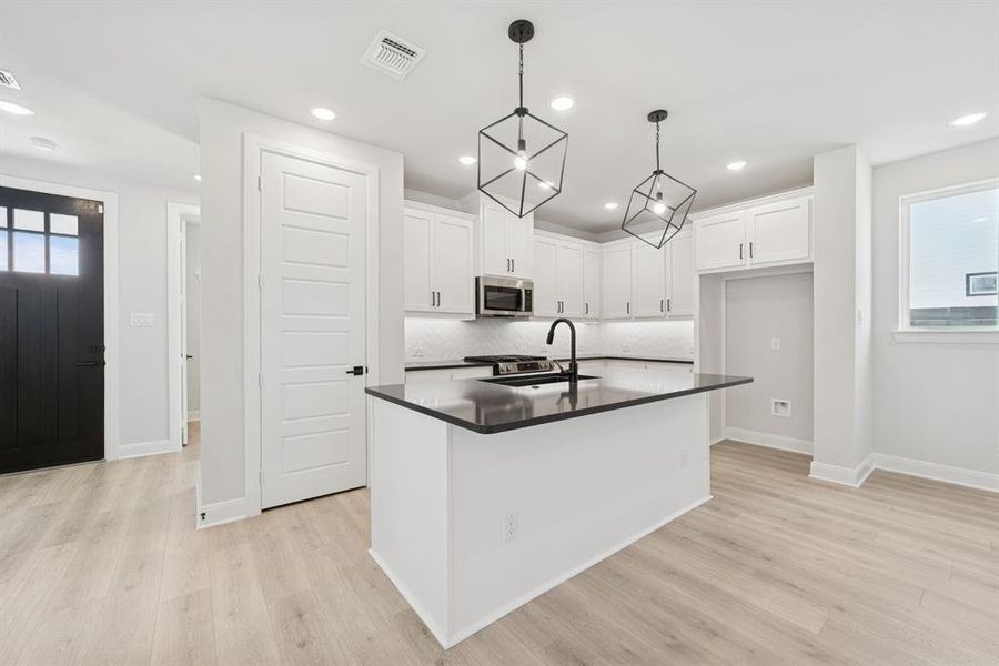 Furnished interior view inside a new home in Painted Tree Woodland West – Cottages, McKinney (Image 6). Furnished interior view inside a new home in Painted Tree Woodland West – Cottages, McKinney (Image 6).