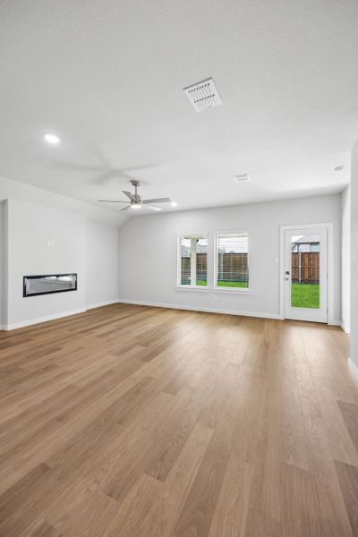 Living Room in the Oscar home plan by Trophy Signature Homes – REPRESENTATIVE PHOTO