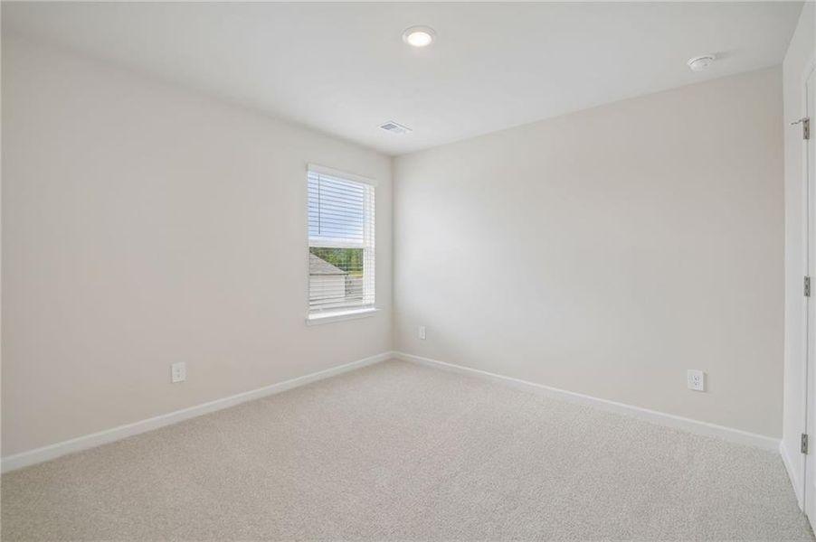 Spacious, unfurnished interior of a new home in Northwoods at Mirror Lake, Villa Rica (Image 33).