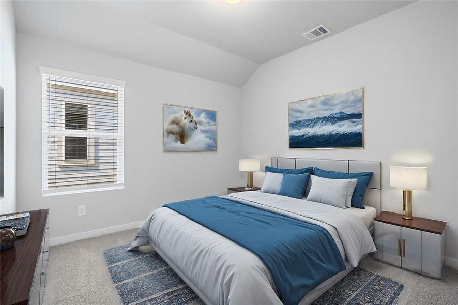 Secondary bedroom features plush carpet, neutral paint, lighting and a large window with privacy blinds.