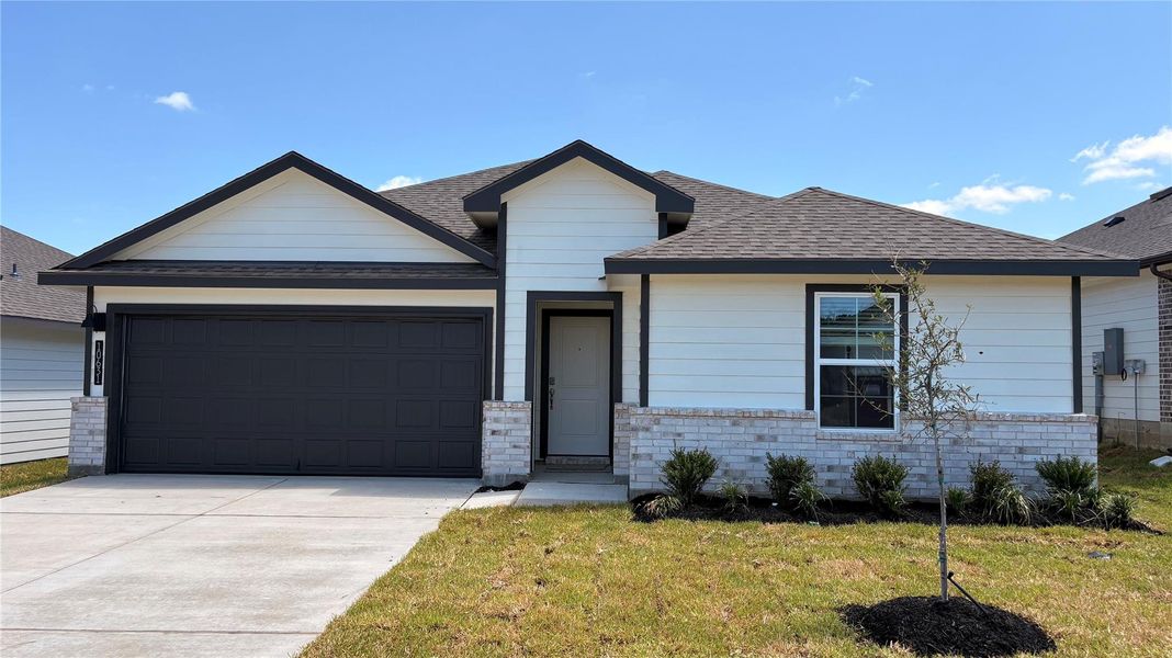 Front exterior of a new home in Knox Landing, Bryan, TX, highlighting curb appeal (Image 1). Front exterior of a new home in Knox Landing, Bryan, TX, highlighting curb appeal (Image 1).