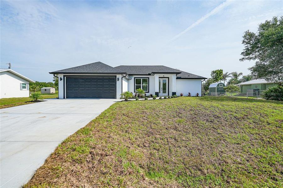 Front exterior of a new home in , Arcadia, FL, highlighting curb appeal (Image 25).