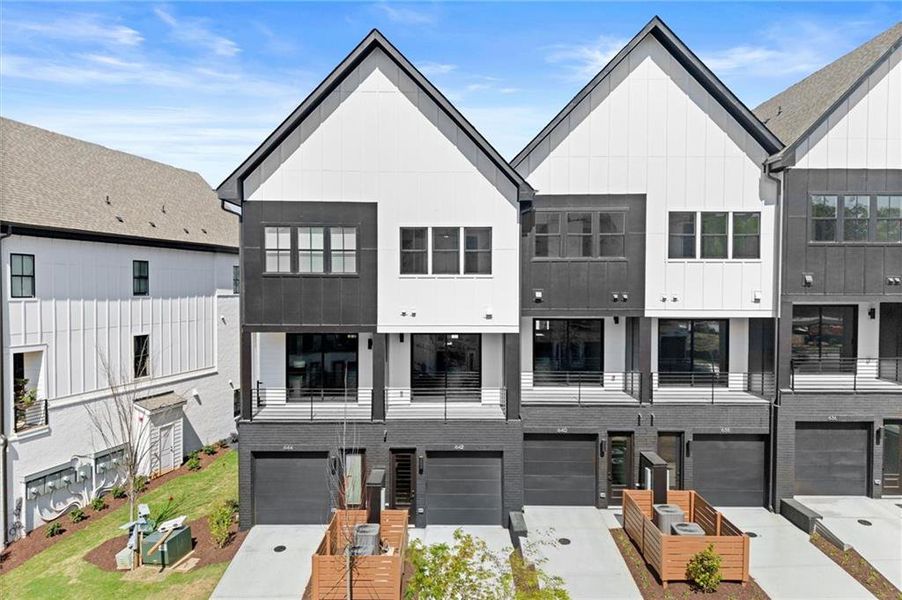 Front exterior of a new home in , Alpharetta, GA, highlighting curb appeal (Image 22).
