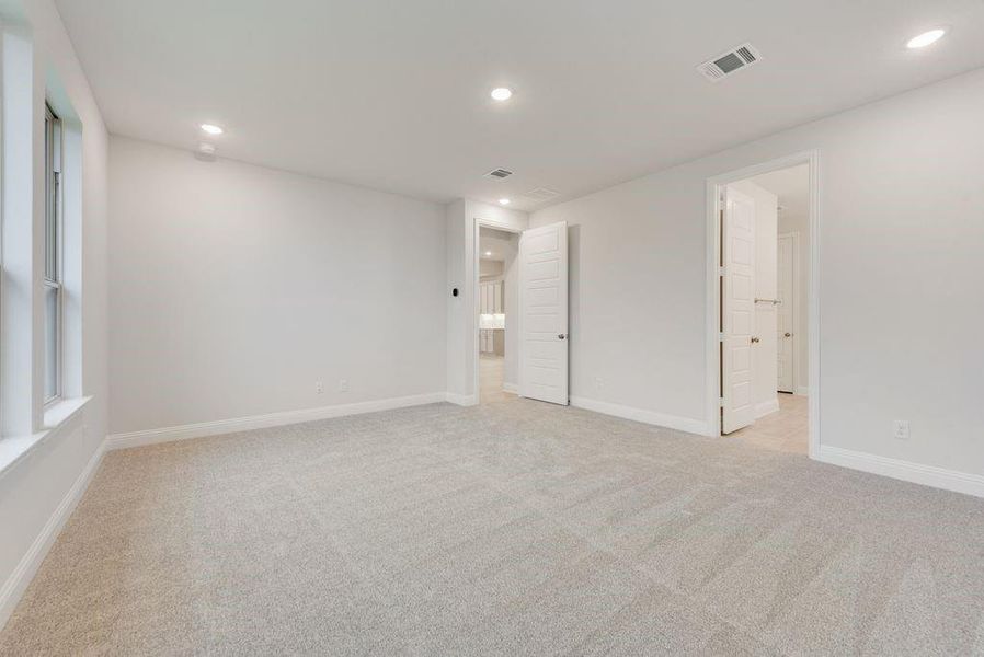 Spacious, unfurnished interior of a new home in Valencia On The Lake, Little Elm (Image 17).