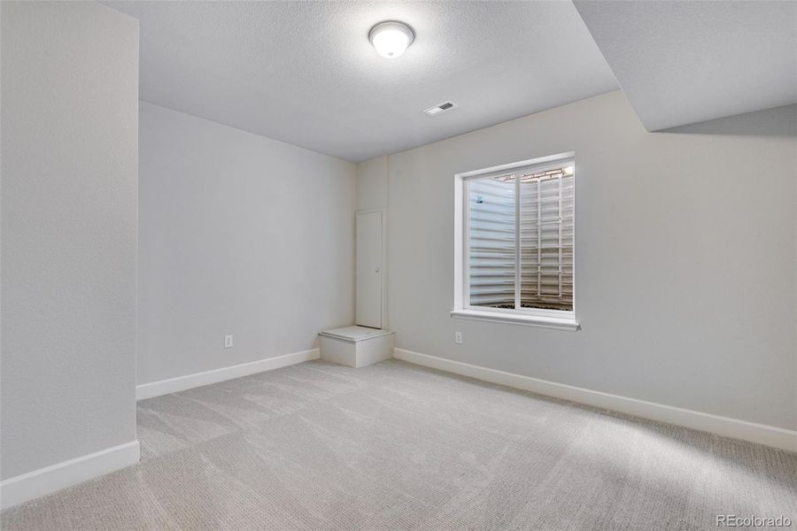 Spacious, unfurnished interior of a new home in Crescendo at The Aurora Highlands, Aurora (Image 33).