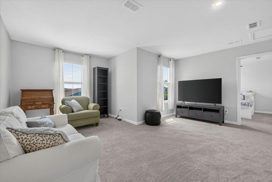 Furnished interior view inside a new home in Sanctuary Cove at Cane Bay, Summerville (Image 18).