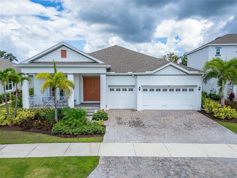 Front exterior of a new home in , Apollo Beach, FL, highlighting curb appeal (Image 18).