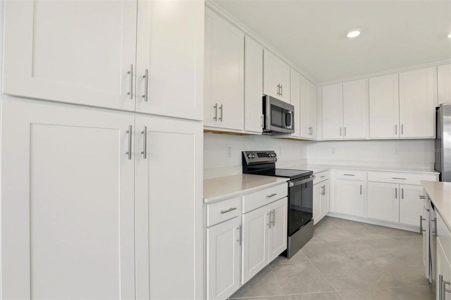 Furnished interior view inside a new home in , Lehigh Acres (Image 9). Furnished interior view inside a new home in , Lehigh Acres (Image 9).