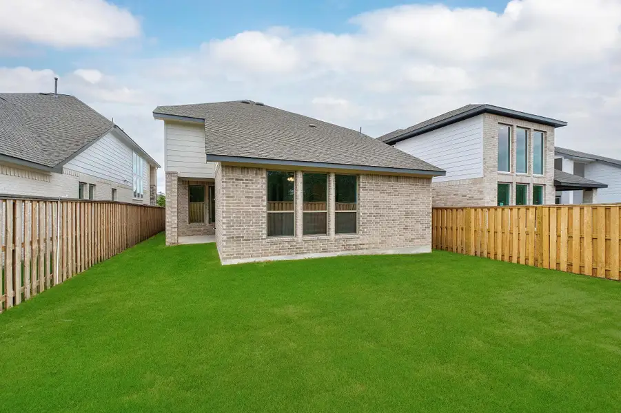 Exterior details and patio area of a home in Parmer Ranch, Georgetown (Image 4). Exterior details and patio area of a home in Parmer Ranch, Georgetown (Image 4).