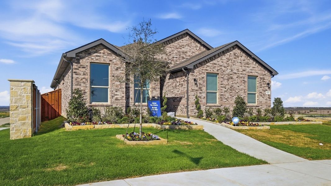 Representative exterior photo of a completed home built from the Portales by D.R. Horton in Bluestem, Rhome, TX (Image 23). Representative exterior photo of a completed home built from the Portales by D.R. Horton in Bluestem, Rhome, TX (Image 23).