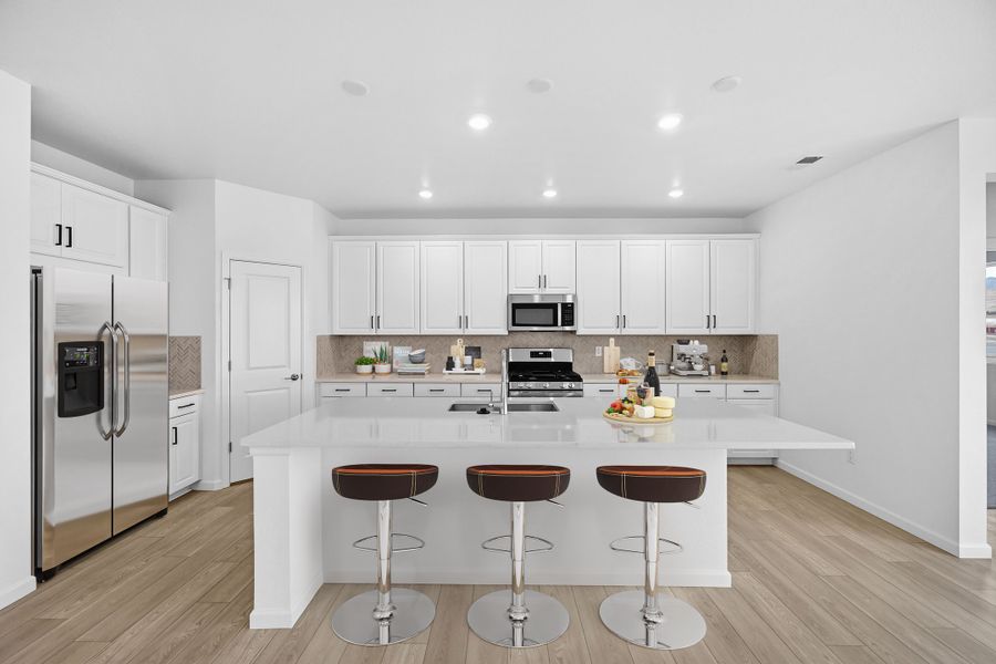Furnished interior view inside a new home in Trailstone, Arvada (Image 4).