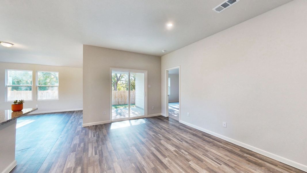 A room with a wood floor and a wood floor with a wood floor. A room with a wood floor and a wood floor with a wood floor.