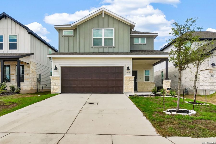 Front exterior of a new home in Corley Farms, Boerne, TX, highlighting curb appeal (Image 19).