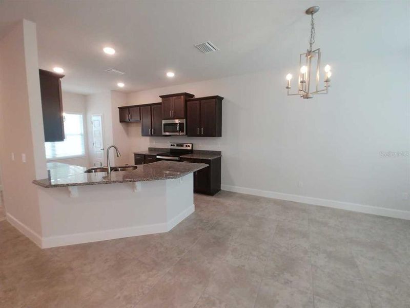 Furnished interior view inside a new home in Ocala Crossings South, Ocala (Image 5). Furnished interior view inside a new home in Ocala Crossings South, Ocala (Image 5).