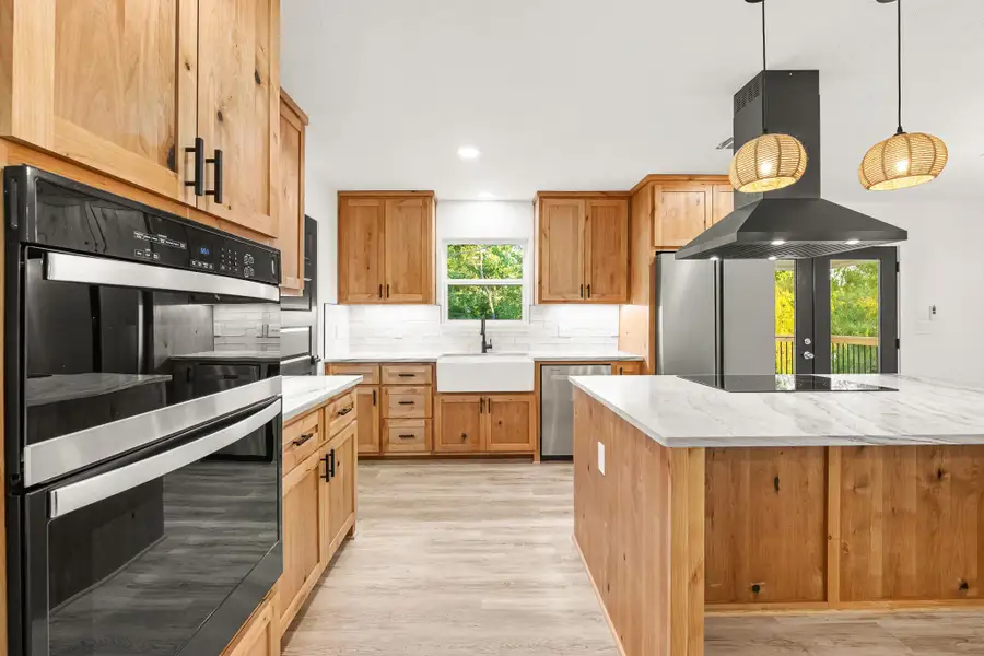 Furnished interior view inside a new home in , Point Blank (Image 16).