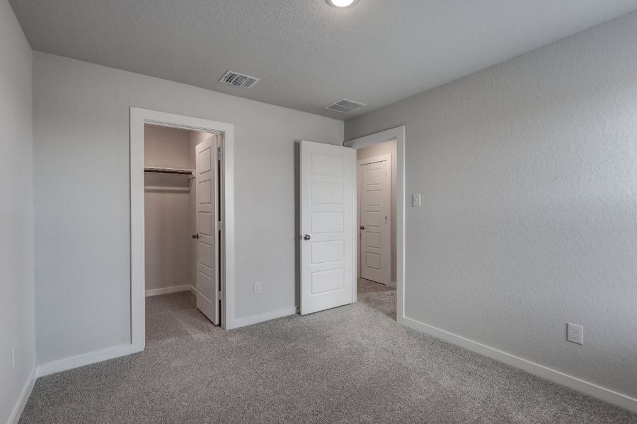 A room with white doors.