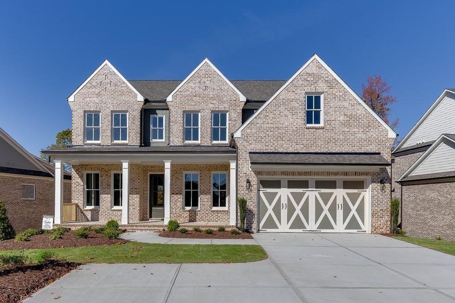 Front exterior of a new home in , Buford, GA, highlighting curb appeal (Image 1).
