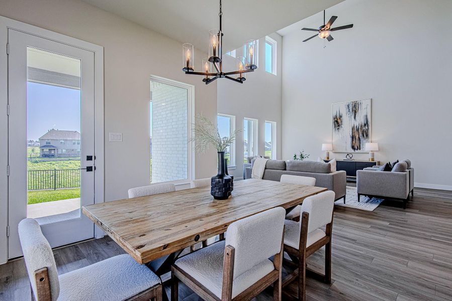 Open-concept dining and living areas filled with natural light