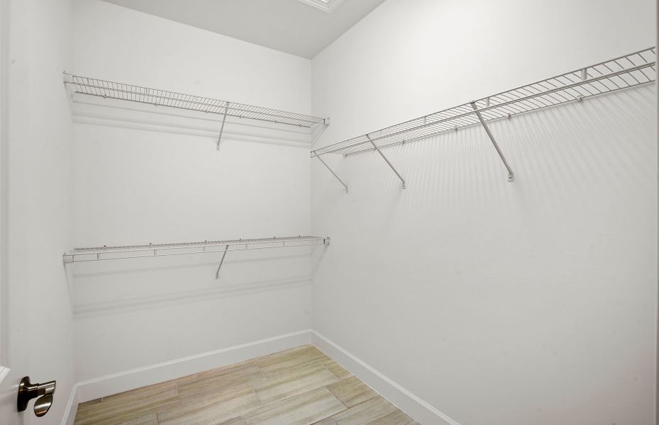 Large walk-in closet Large walk-in closet