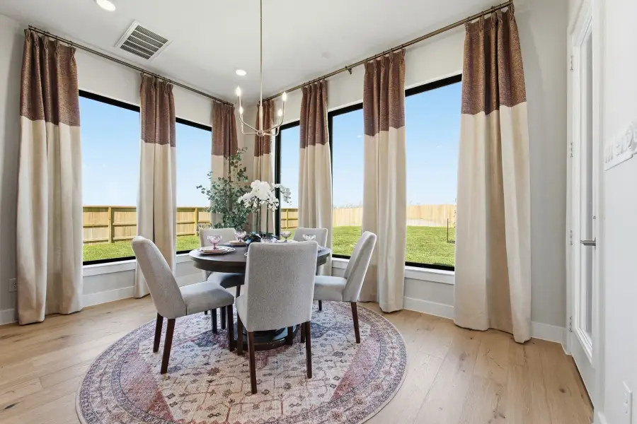 Representative furnished interior of a home built from the Laguna III by CastleRock Communities in Lakesong, Grand Prairie (Image 30).