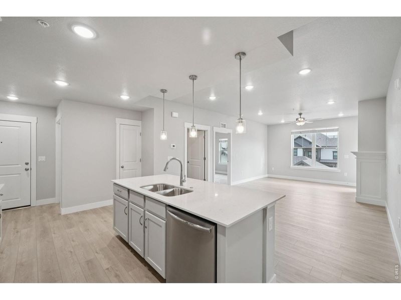 Furnished interior view inside a new home in Highlands at Fox Hill - The Flats, Longmont (Image 4).