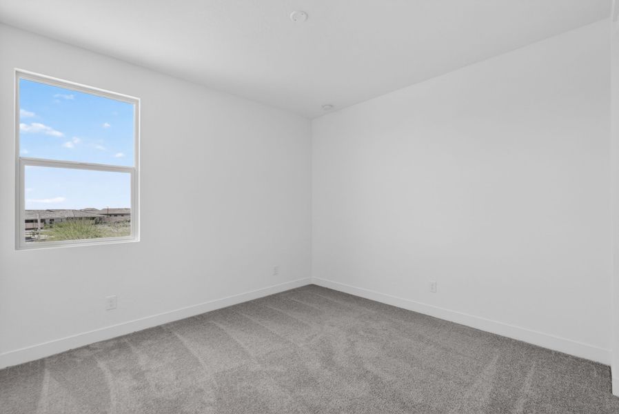 Spacious, unfurnished interior of a new home in Artisan at Asante, Surprise (Image 21).