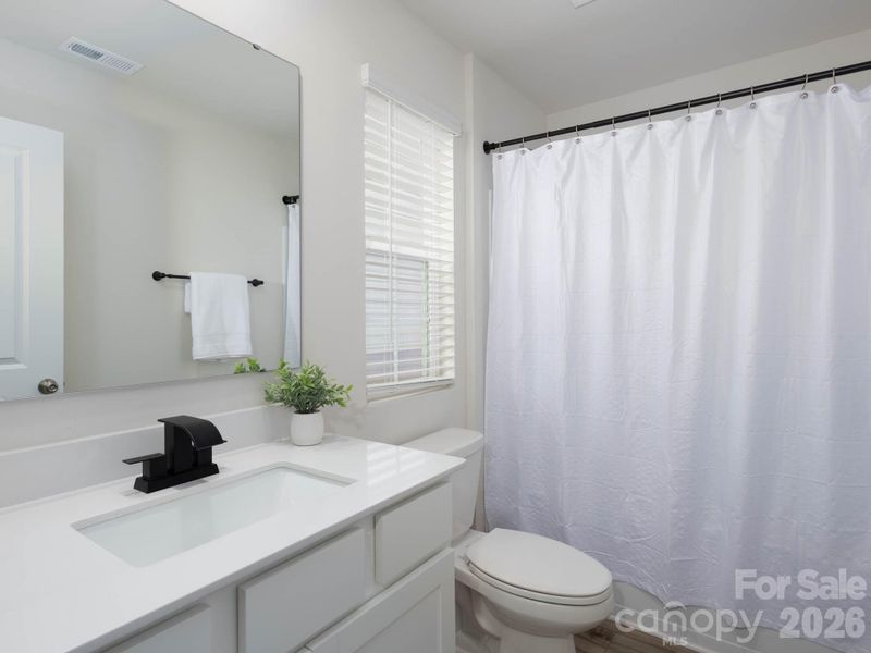 Downstairs full bathroom.
