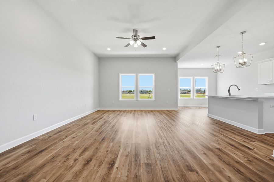 Photos of a similar home. Living