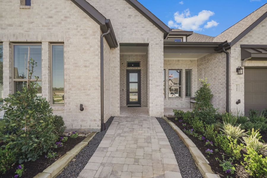 Representative exterior details of a home built from the Montgomery by Chesmar Homes in Meridiana 50's and 60's, Manvel (Image 3).
