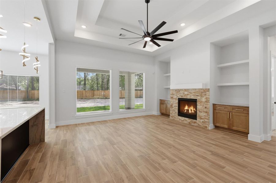 Your fireplace is situated between two storage and display centers which could be purposed as bookshelves, media centers, bars, and plenty more!