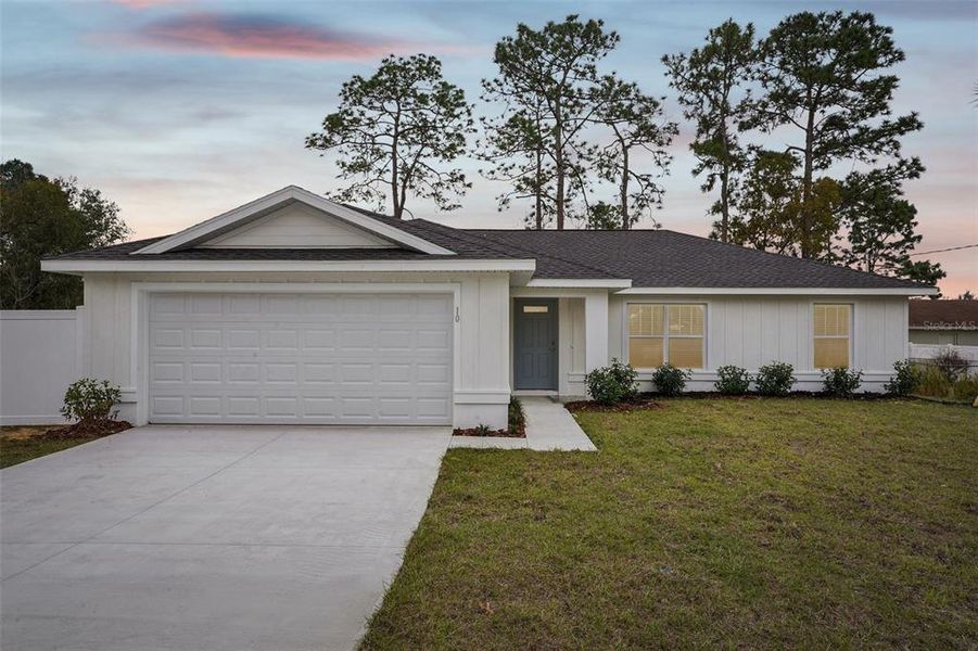 Front exterior of a new home in , Ocala, FL, highlighting curb appeal (Image 26). Front exterior of a new home in , Ocala, FL, highlighting curb appeal (Image 26).
